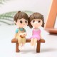 Figurines Enfants sur un banc