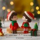 Figurines Enfants de Noël sur un banc