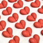 Coeurs rouges en glaçage royal